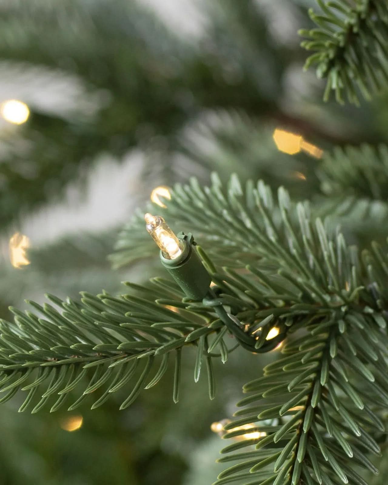 European Fir Christmas Tree with Articulated Branches, Metal Stand and Built-in Micro LEDs